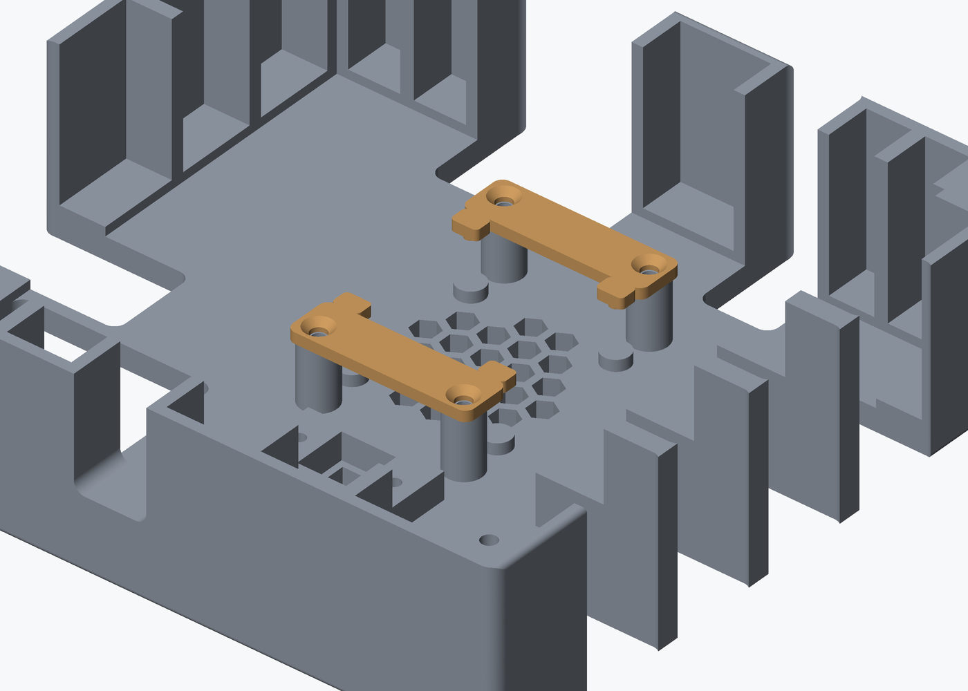 Render of the inside of the cover with both fan retainers in colour, each lying across the honeycomb vent on two posts with a countersunk screw hole at either end