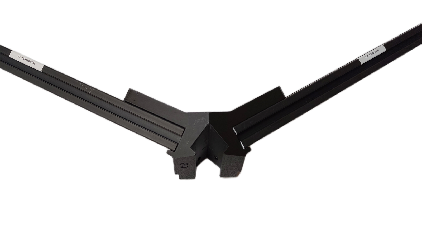 Angled view of the same corner joint, showing the fasteners along the extrusion
