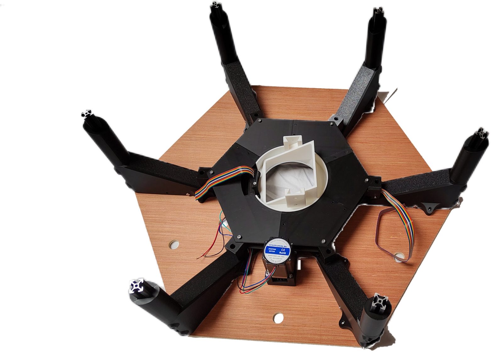 An interface spacer slid onto each vertical extrusion support, lips facing inward