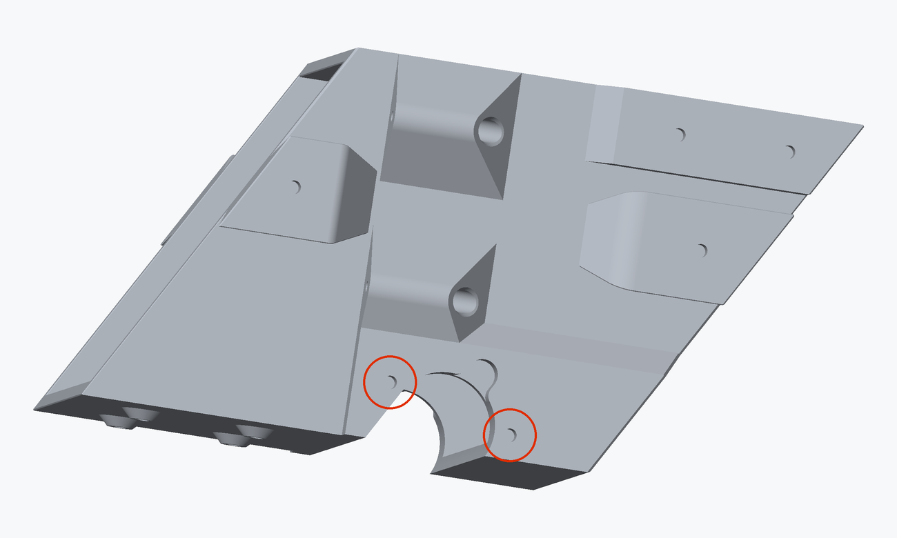 Render of the other long side of the chute core with two heat inserts circled in red