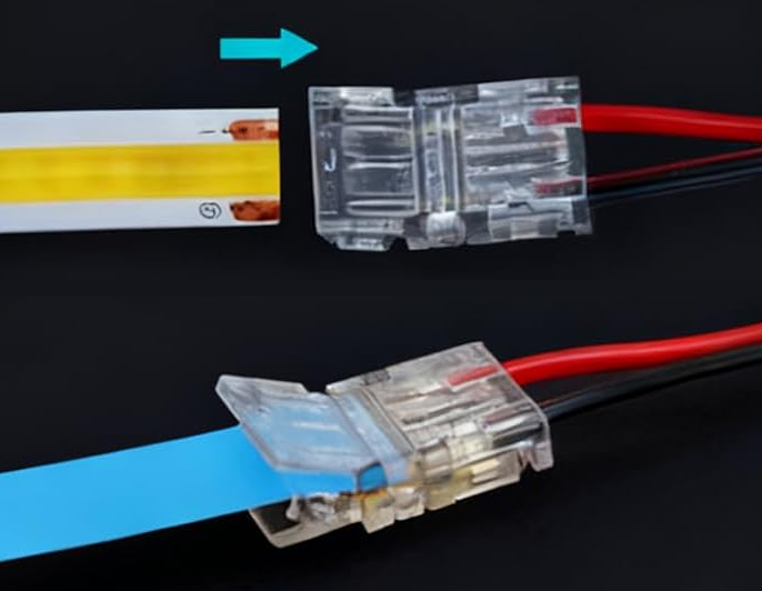 Two stages of clamping: above, the cut end of a COB strip lined up with the open connector, an arrow showing it going in, with red and black wire already in the far end; below, the connector pressed shut on the strip with the pair leaving it