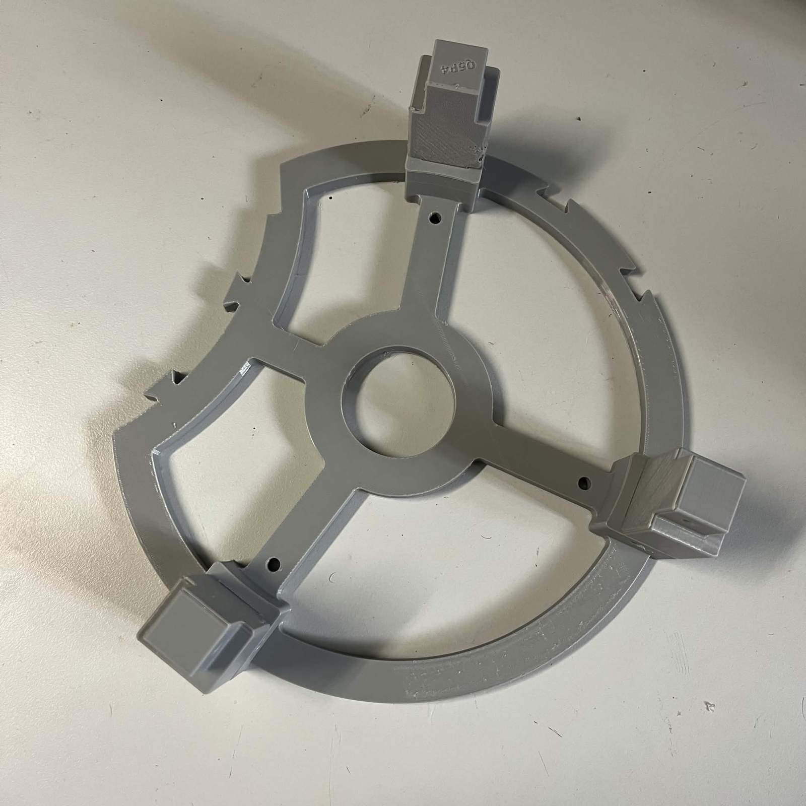 C3's stand: the layout guide with three short printed support legs and their dovetail adapters