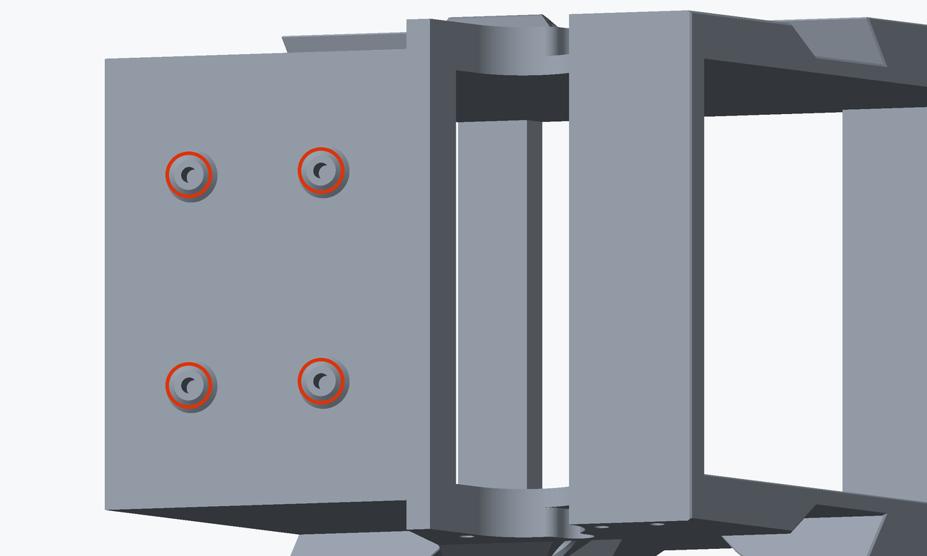 Close render of the rear end of the chute core with the four heat inserts the layer adapter board screws into circled in red